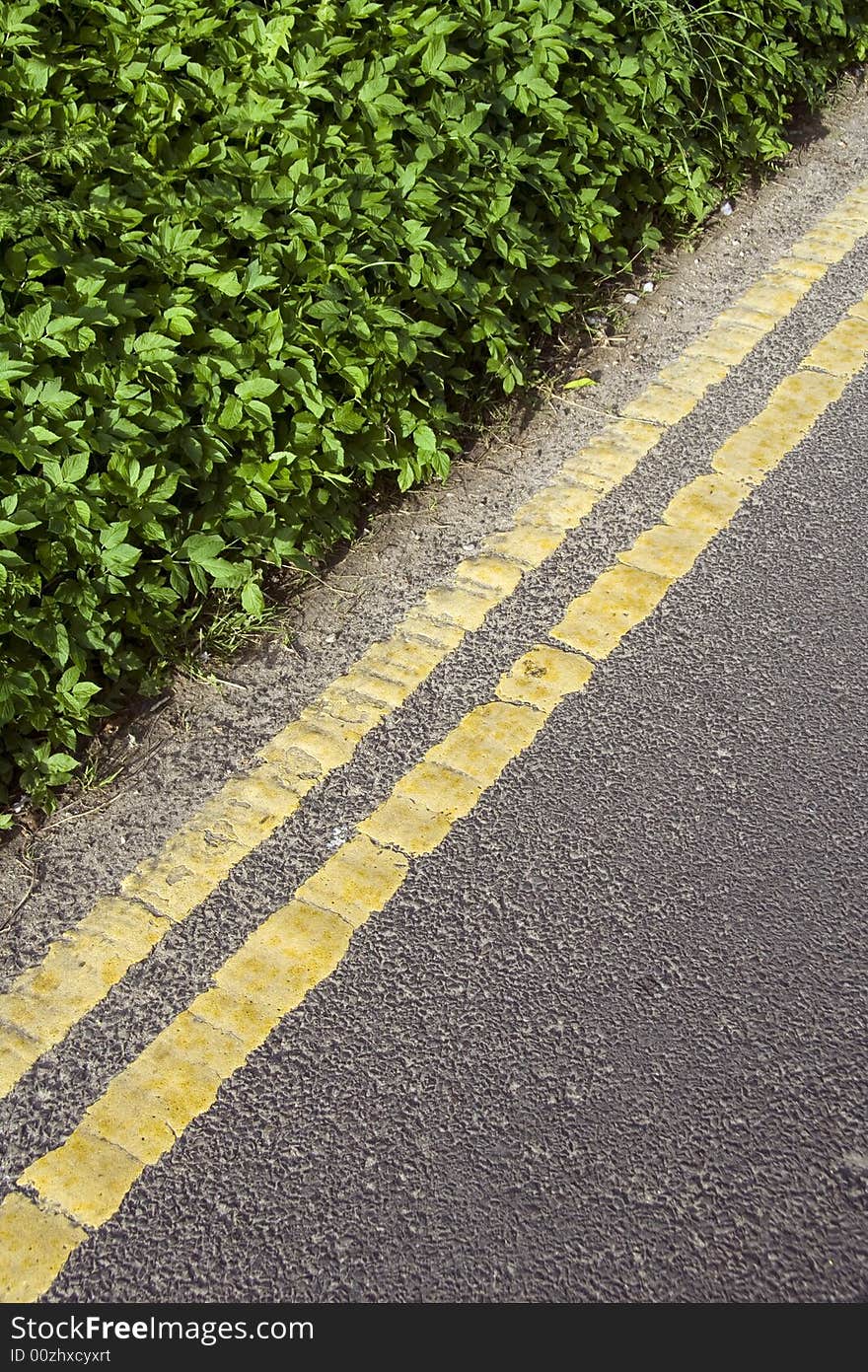 Yellow lines on country lane