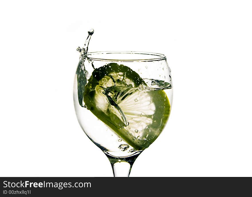 Lemon splashing into water isolated