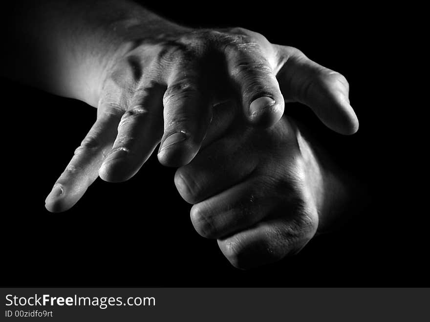 Close-up hands of the man over black. Close-up hands of the man over black