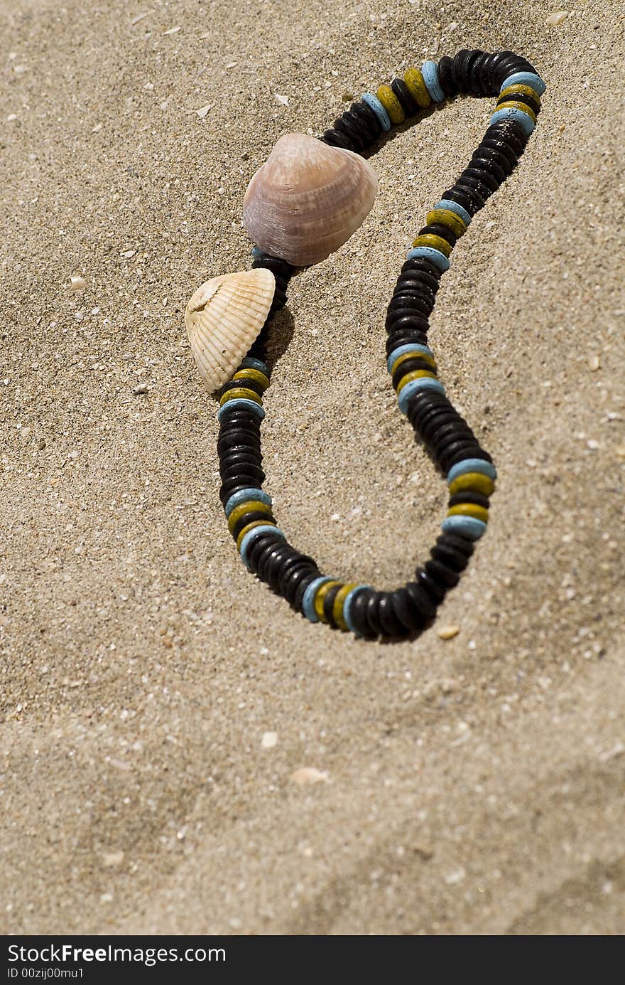 Necklace on the sand