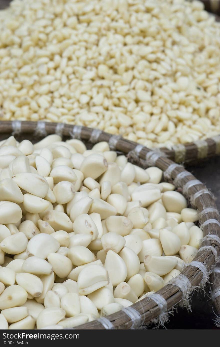 Peeled Garlic At A Market