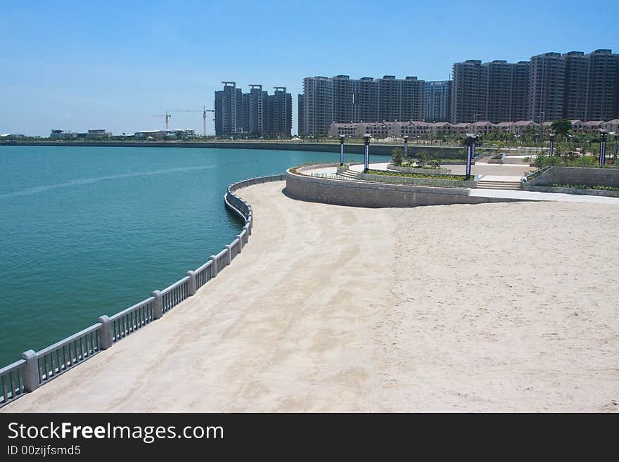 Coast with White railing and sand. Coast with White railing and sand