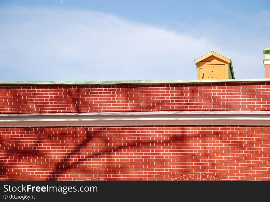 Brick wall lit by sun