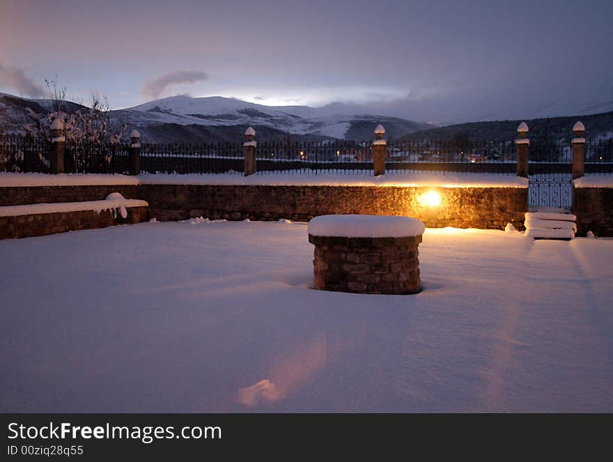 Court yard full of snow in a small village in mountains