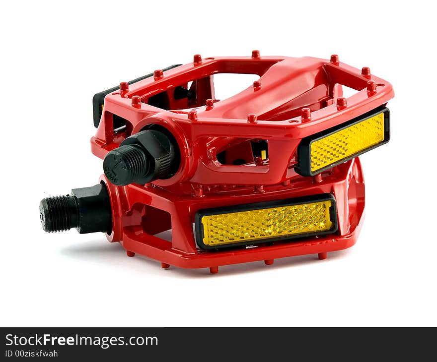 Red cycling pedals isolated on white background