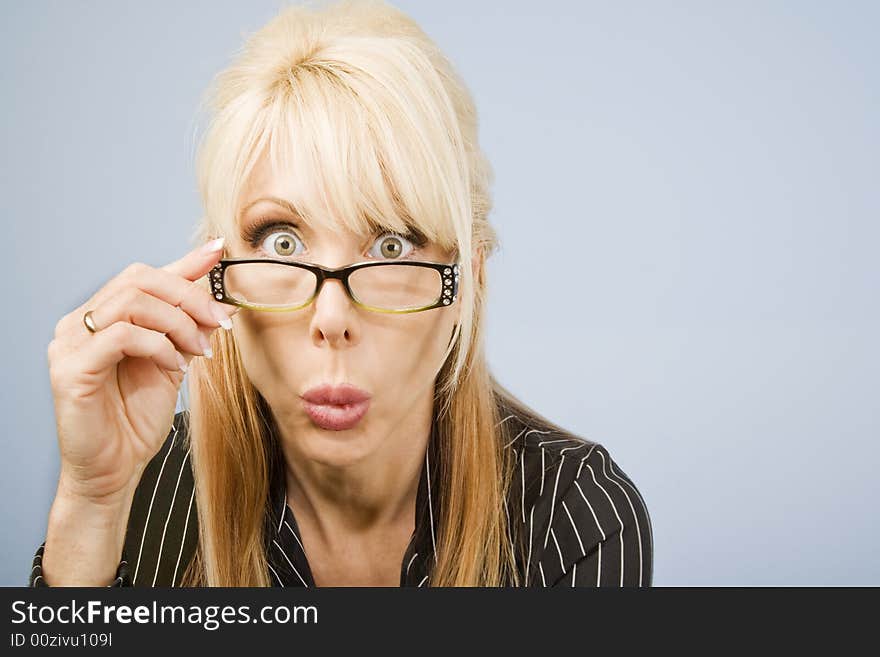 Woman Looking Over Her Glasses