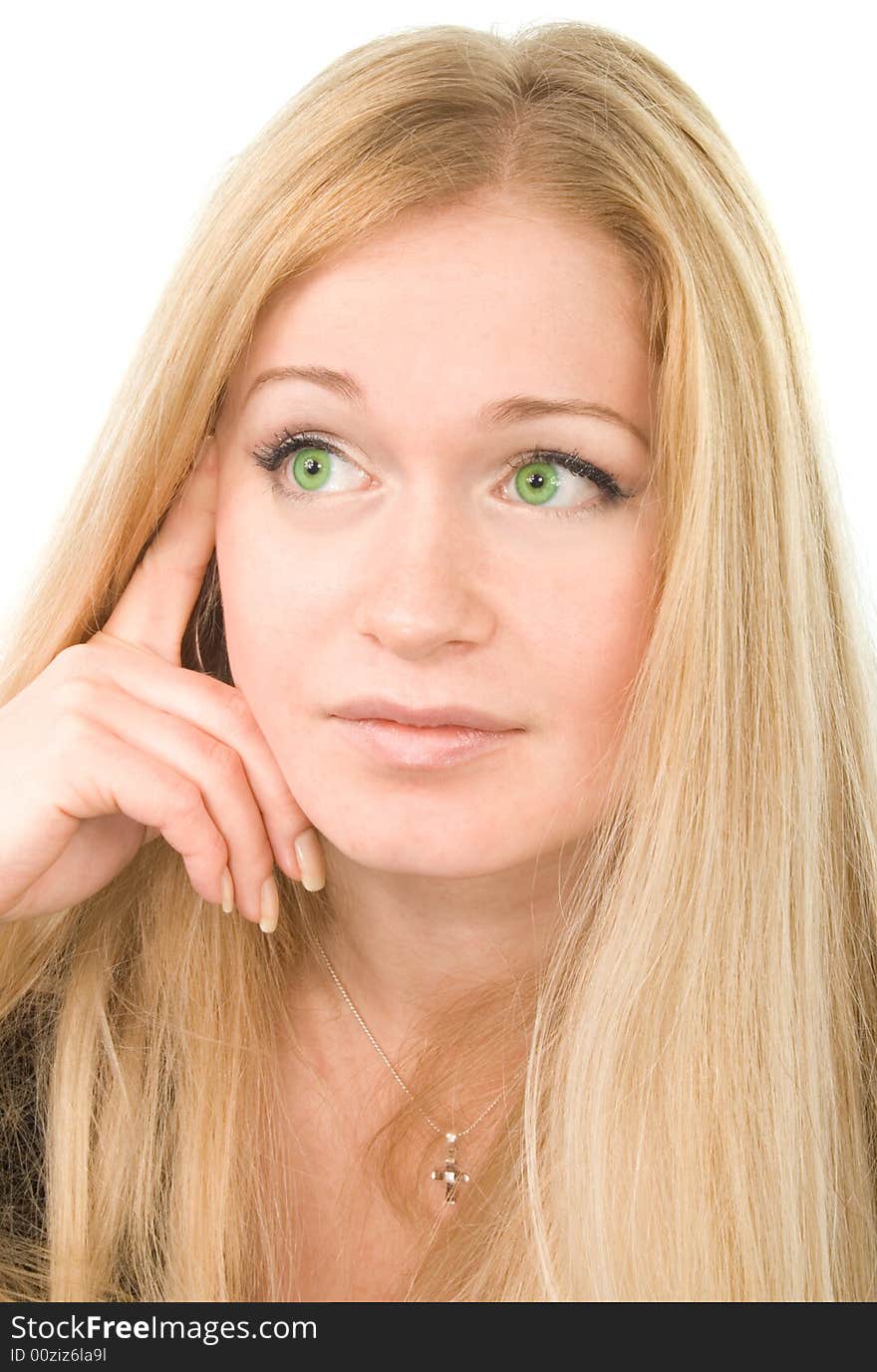 Close-up portrait of young attractive green-eyed woman on white background