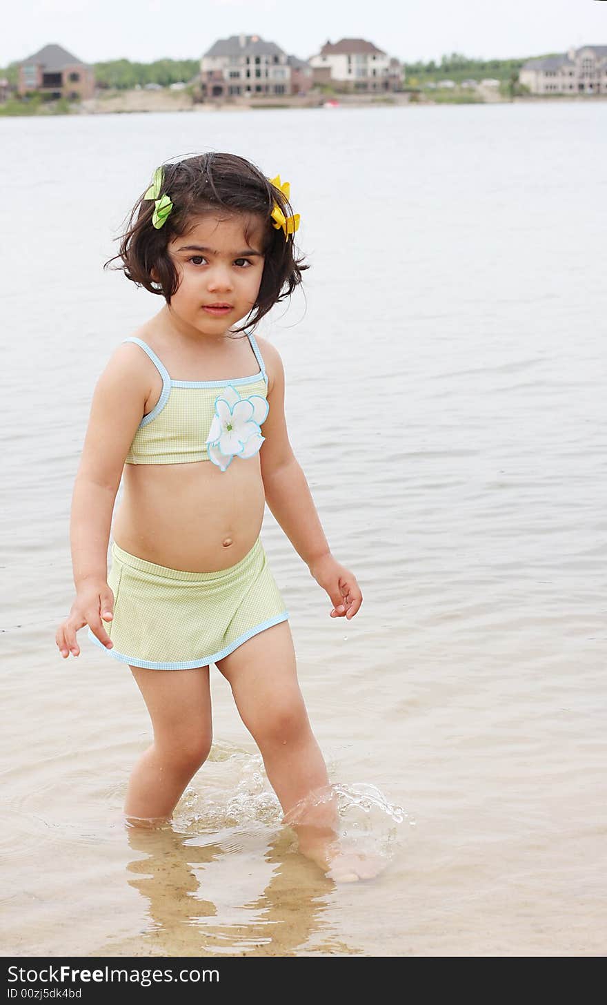 Toddler Splashing Water