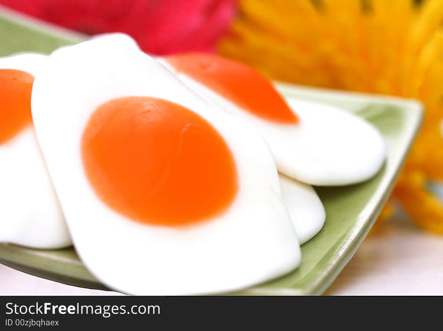 Gummi fryed eggs and flower close up