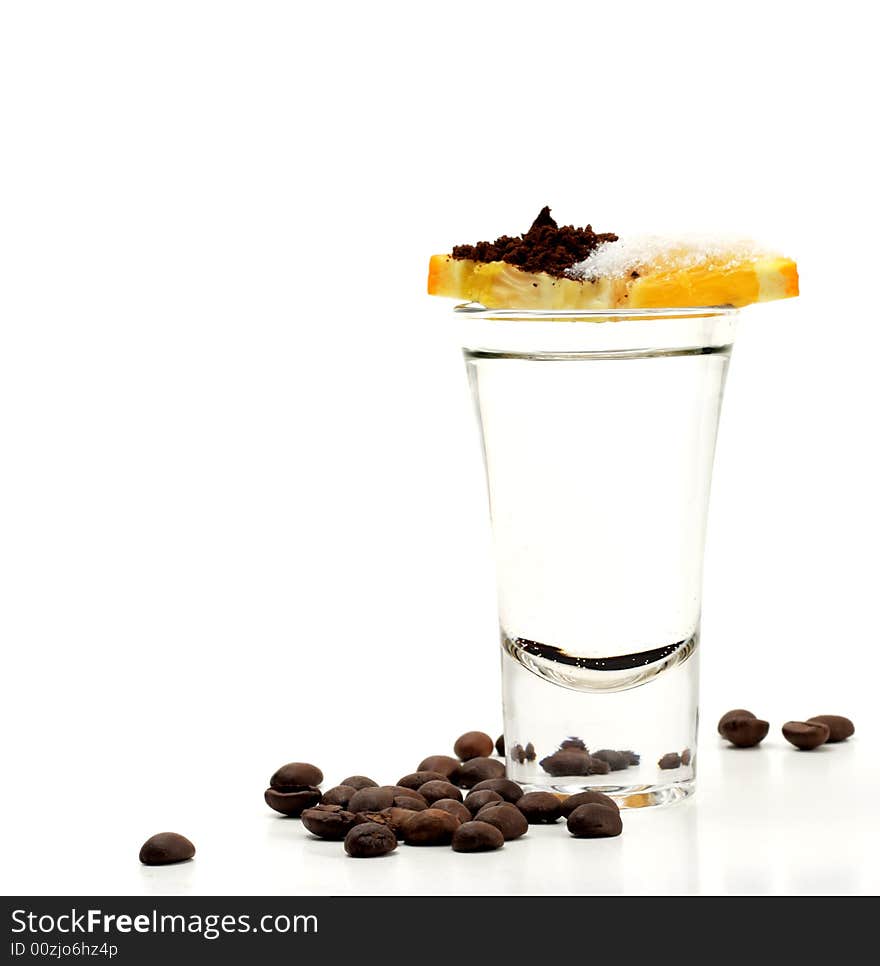 Hard Drink: Vodka, Lemon Slice, Salt and Cinnamon. Coffee Crop Garnish. Isolated on White Background. Hard Drink: Vodka, Lemon Slice, Salt and Cinnamon. Coffee Crop Garnish. Isolated on White Background.