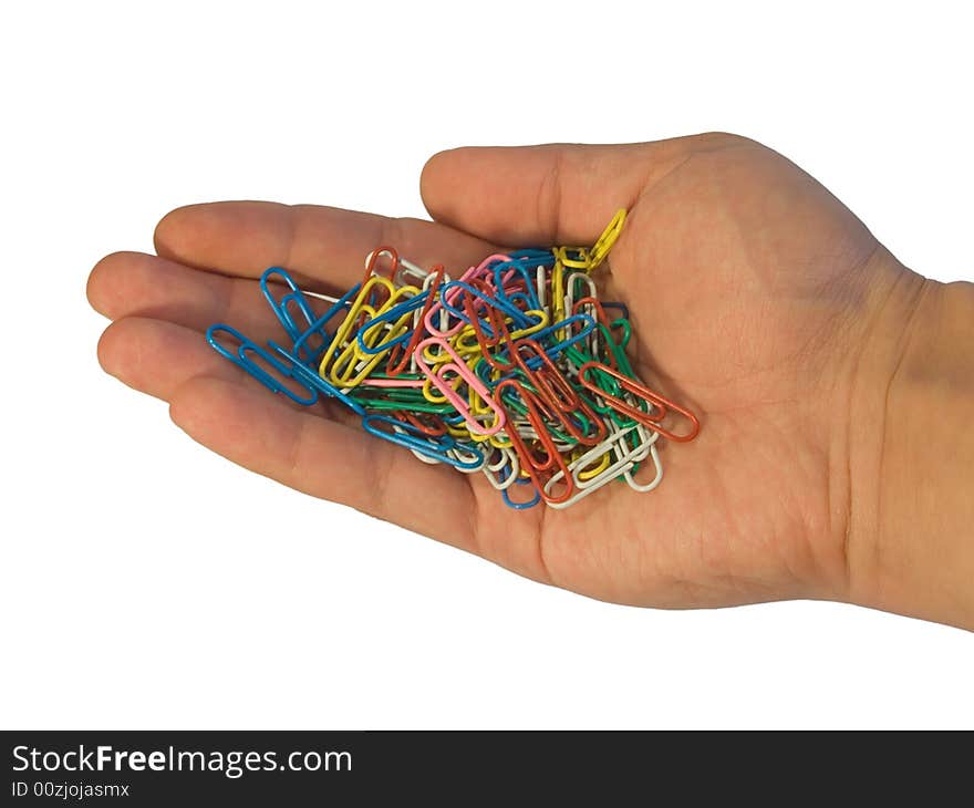 Paper clip in hand isolated on white background