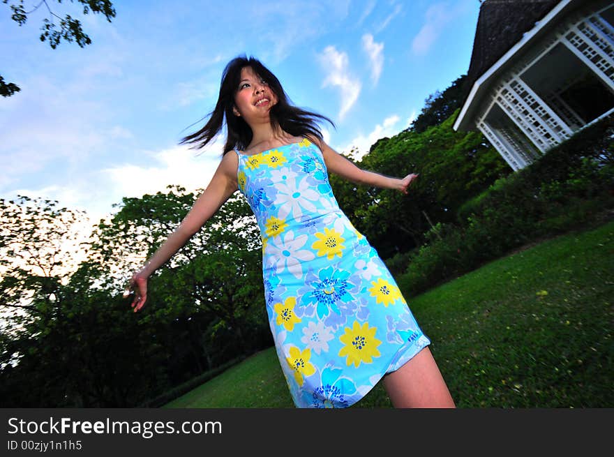 Picture of a Happy Girl out in the park. Indicative of mood, joyous occasion, promotion of healthy living and lifestyle. Picture of a Happy Girl out in the park. Indicative of mood, joyous occasion, promotion of healthy living and lifestyle.