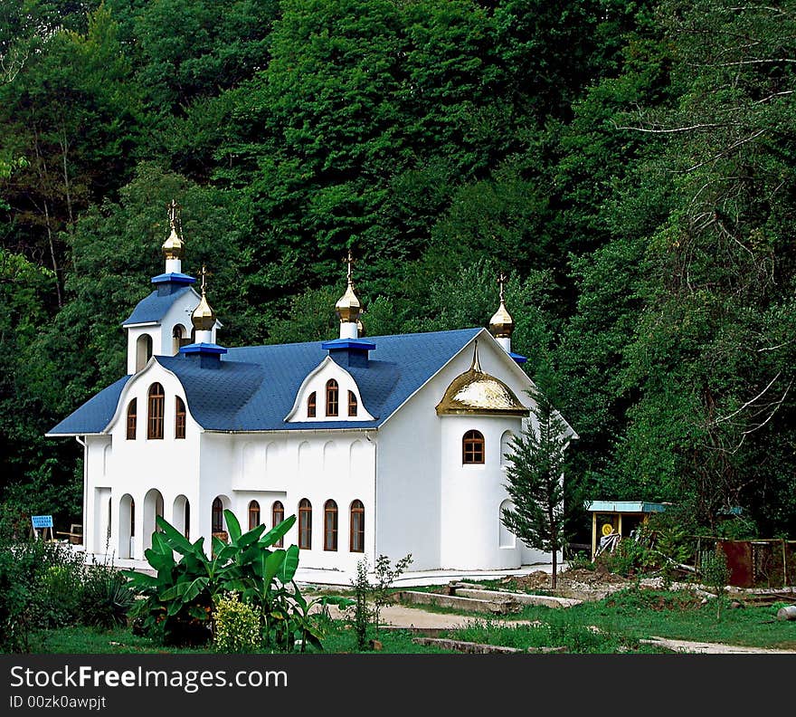 Photo of the building of christianity church in the forest