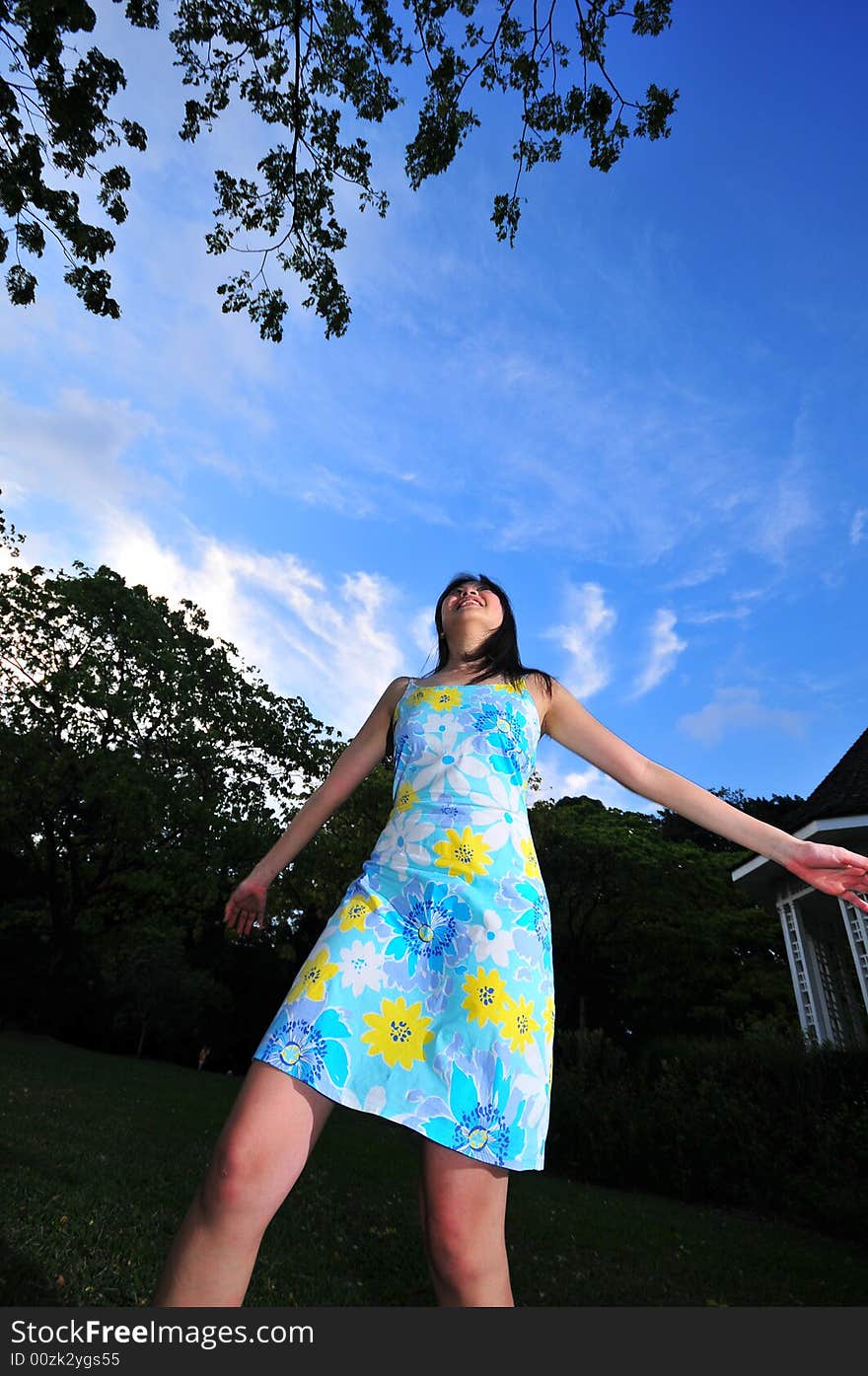 Picture of a Happy Girl out in the park. Indicative of mood, joyous occasion, promotion of healthy living and lifestyle. Picture of a Happy Girl out in the park. Indicative of mood, joyous occasion, promotion of healthy living and lifestyle.