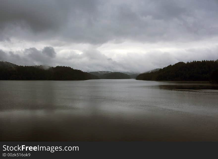 Lake Scene During Cloudy Evening