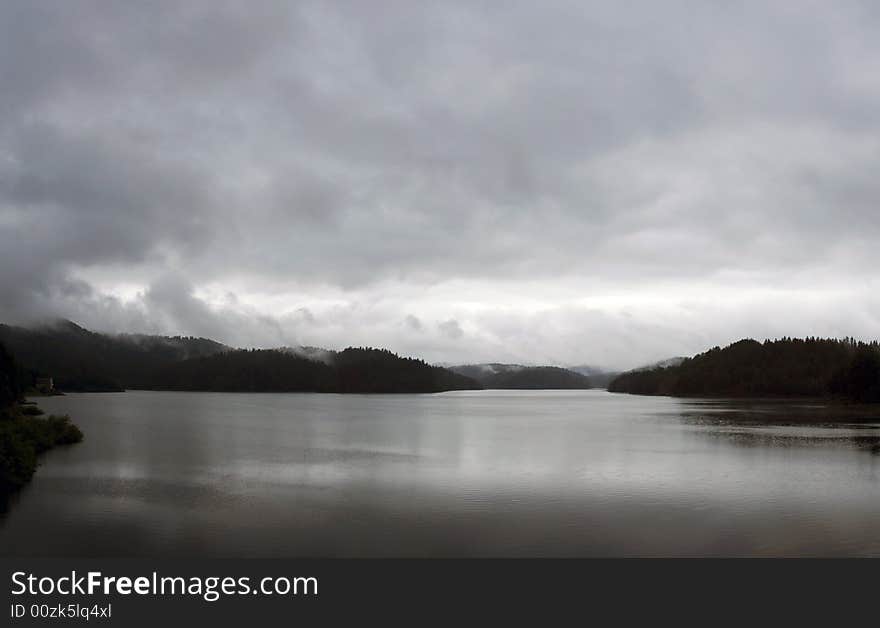 Lake scene during cloudy evening