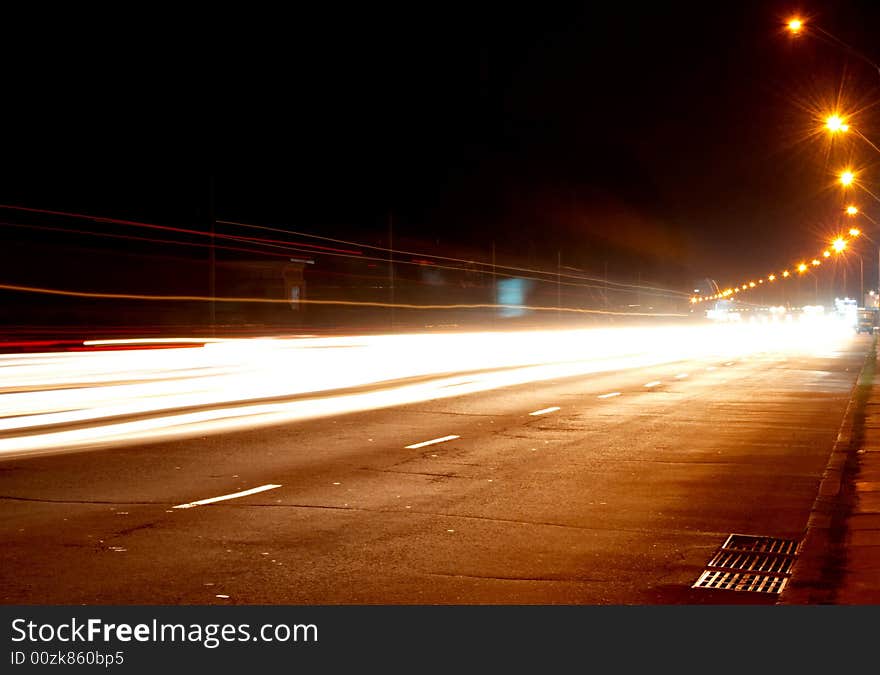 Car lights on highway in the night