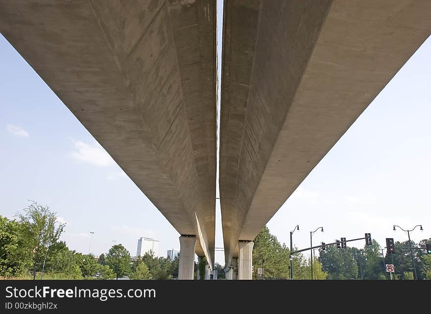 A pair of rapid transit rail bridges into the distance. A pair of rapid transit rail bridges into the distance