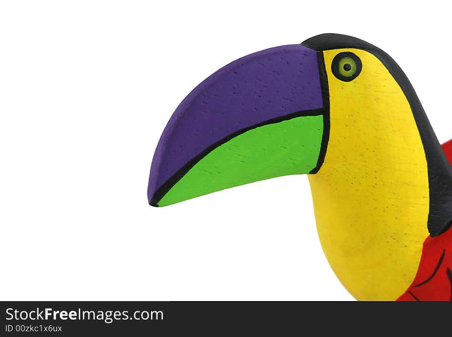 Isolated Brightly colored handcarved wooden toucan