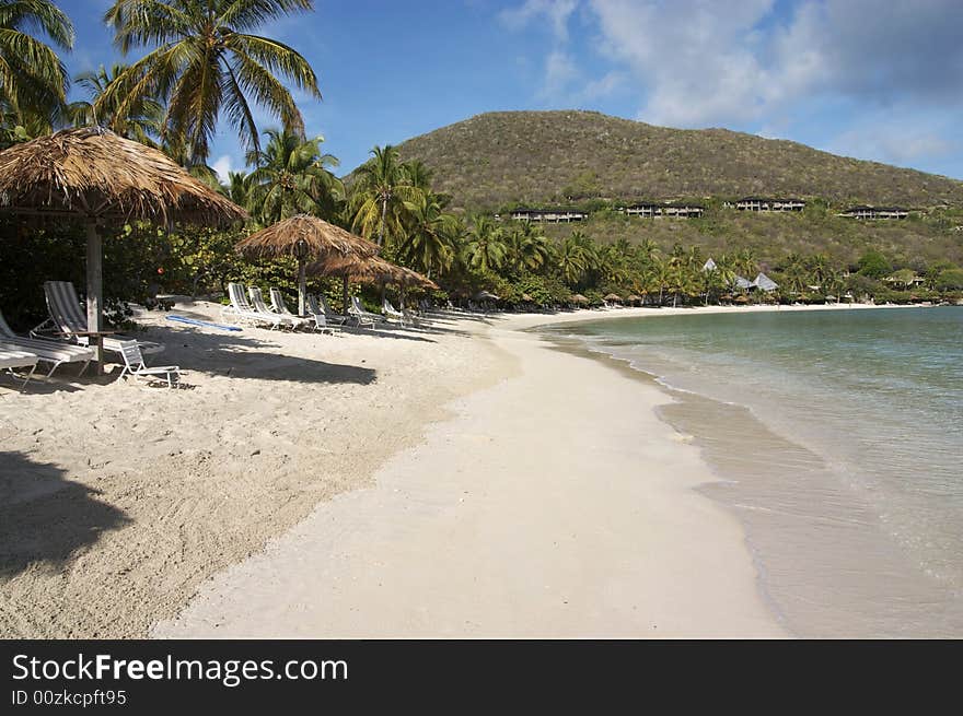 A view of a peaceful island beach resort.