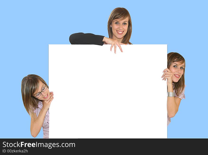 Young business girls with white card on blue background