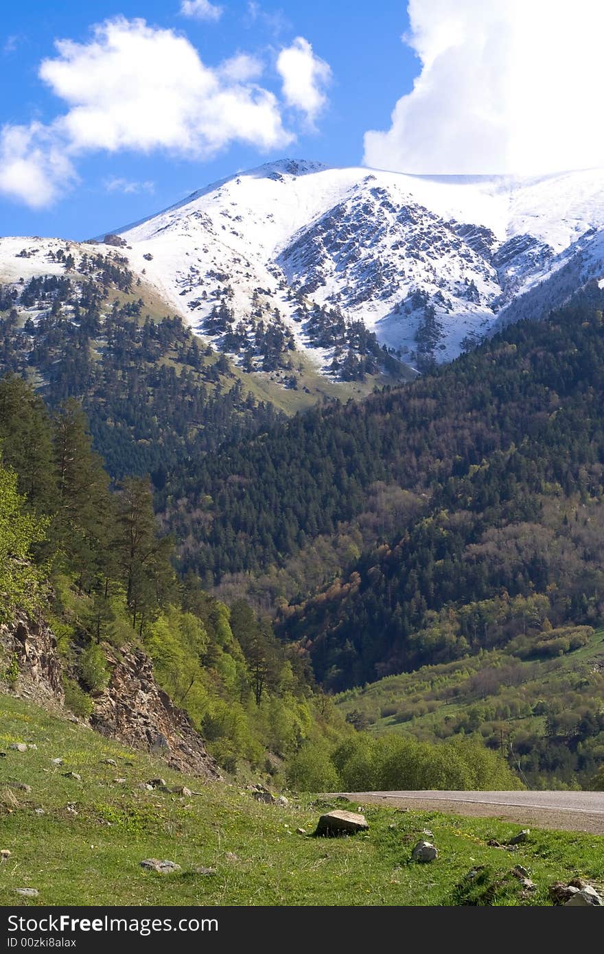 Caucasus: magnificent mountain panorama with blue sky