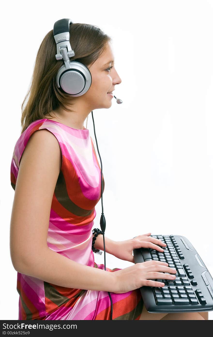 Female operator with headset and keyboard