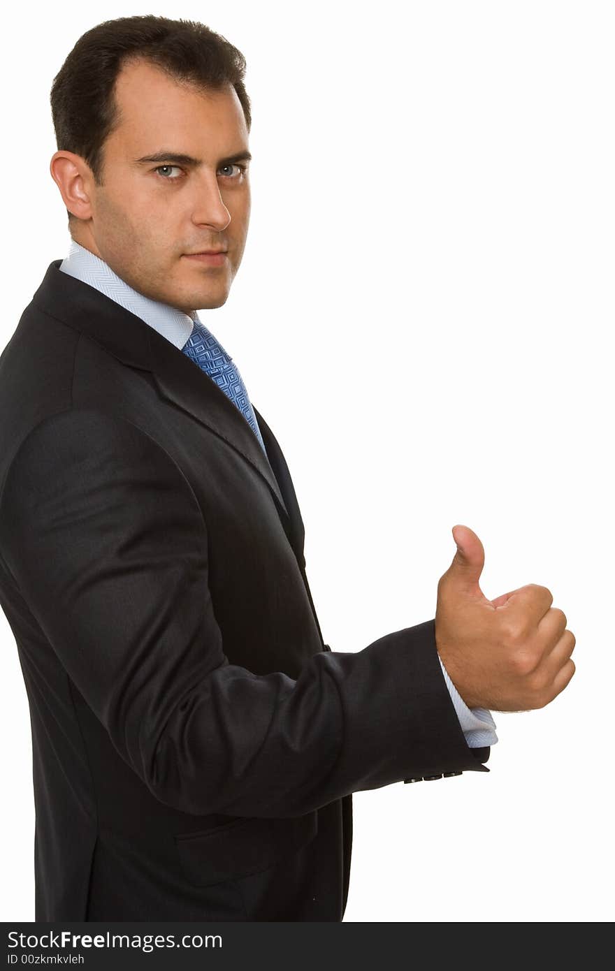 Portrait of a young attractive businessman giving the thumbs-up sign. Portrait of a young attractive businessman giving the thumbs-up sign