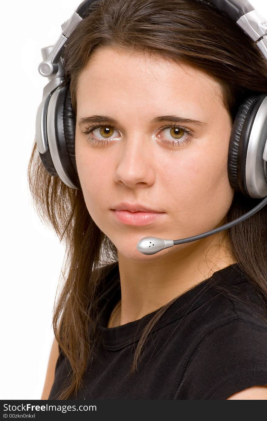 Female operator with headset looking at the camera