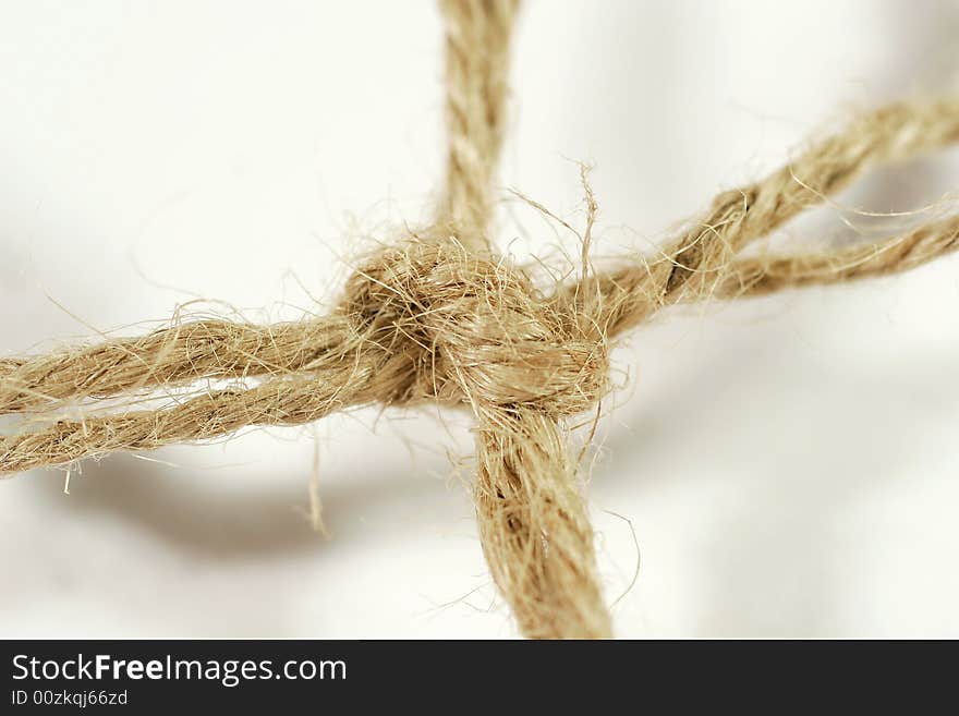 Close-up of a knot (worn rope)
