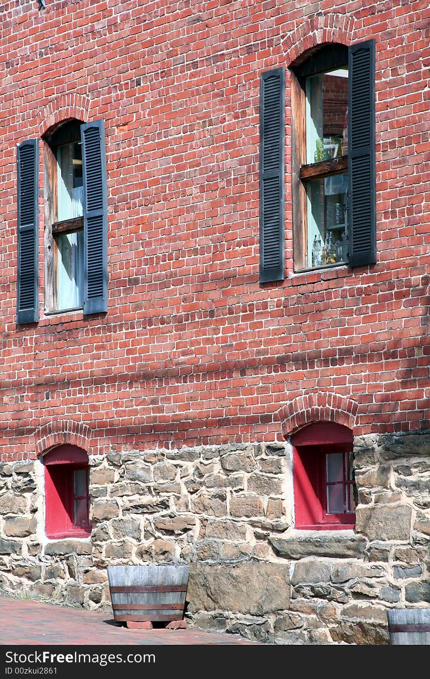 The side of a quaint brick building