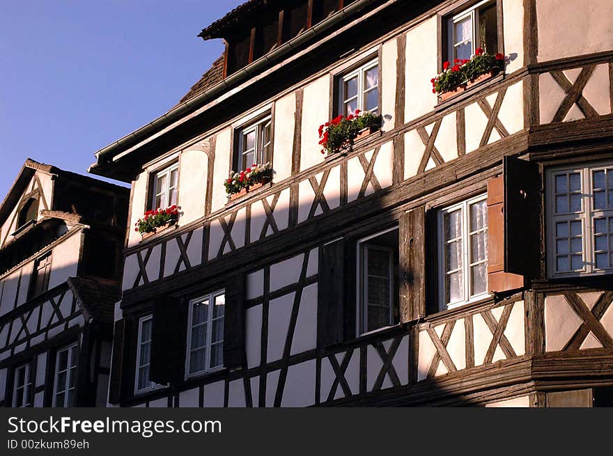 A traditional half-timbered house in Strasbourg in the region of Alsace, France. A traditional half-timbered house in Strasbourg in the region of Alsace, France.