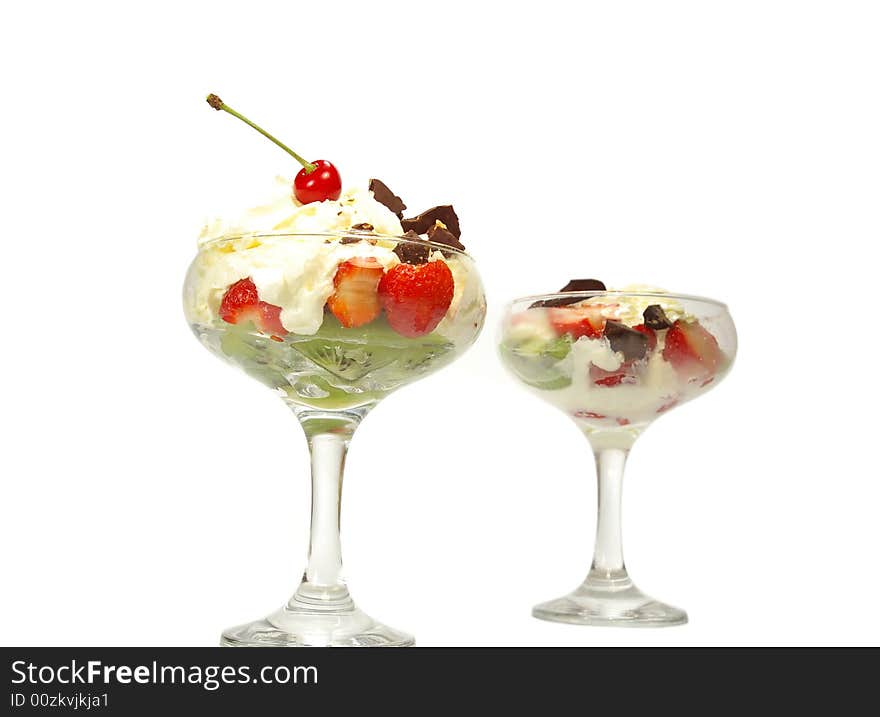 Whipped cream and strawberrie. Image isolated on white. Whipped cream and strawberrie. Image isolated on white.