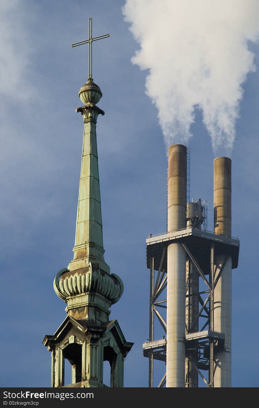 Contrast between church and chimney