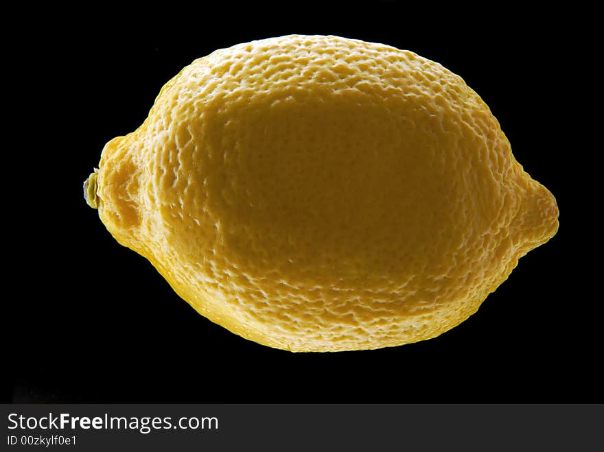 Lemon isolated on black. back light. Lemon isolated on black. back light