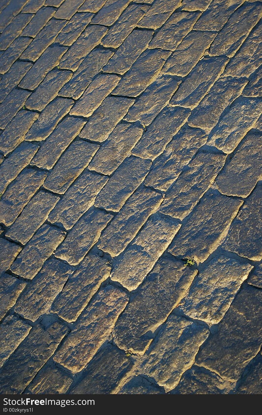 Traditional and historic cobblestone way. Beautiful background