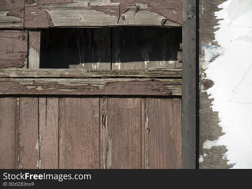 An old and rotten wooden building. An old and rotten wooden building