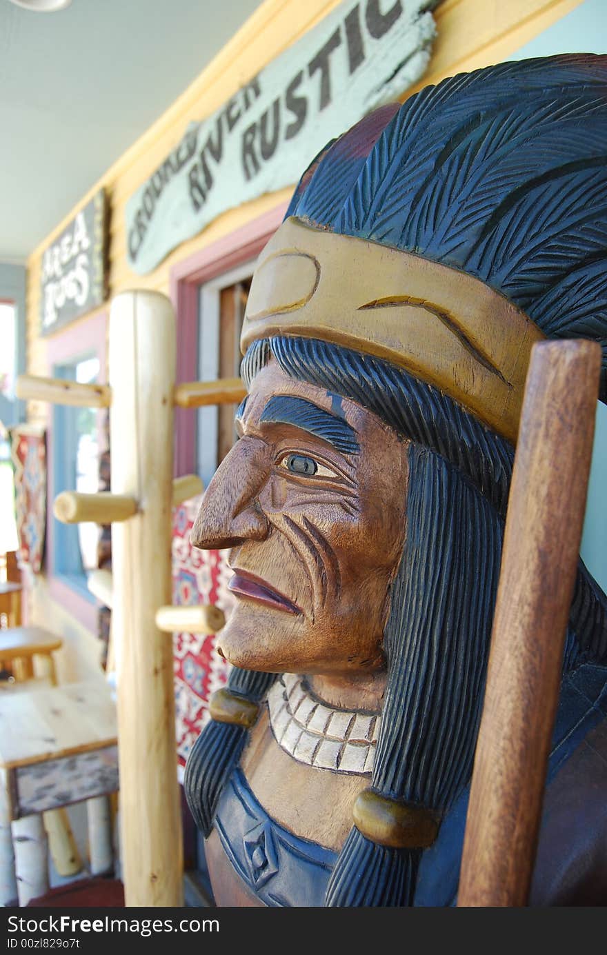 An old cigar shop indian at an antique store. An old cigar shop indian at an antique store.