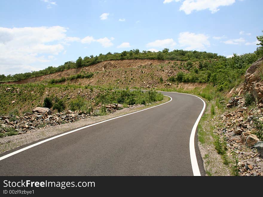 A view of road left turn curve in tibet. A view of road left turn curve in tibet