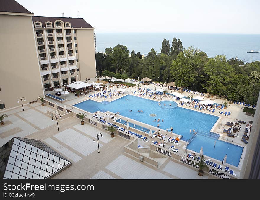 Swimming pool side with chairs