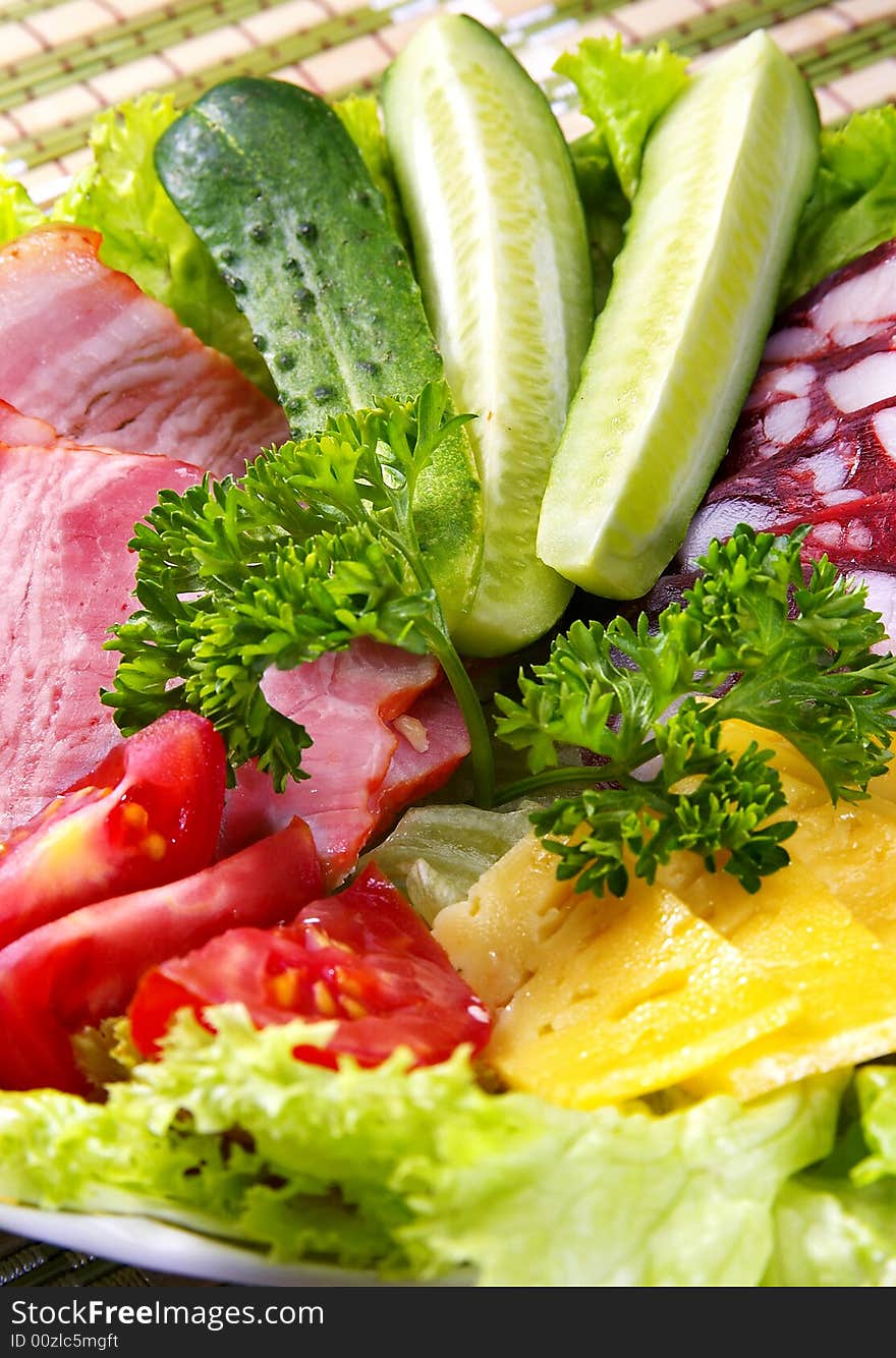 Close-up of a  vegetables, cheese and meat. Close-up of a  vegetables, cheese and meat