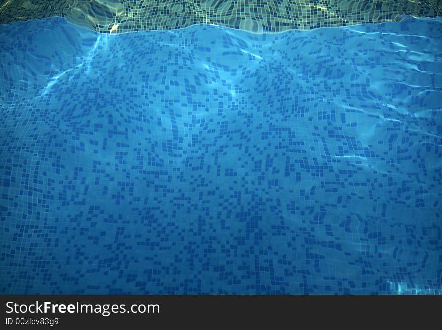 Swimming pool with water reflections