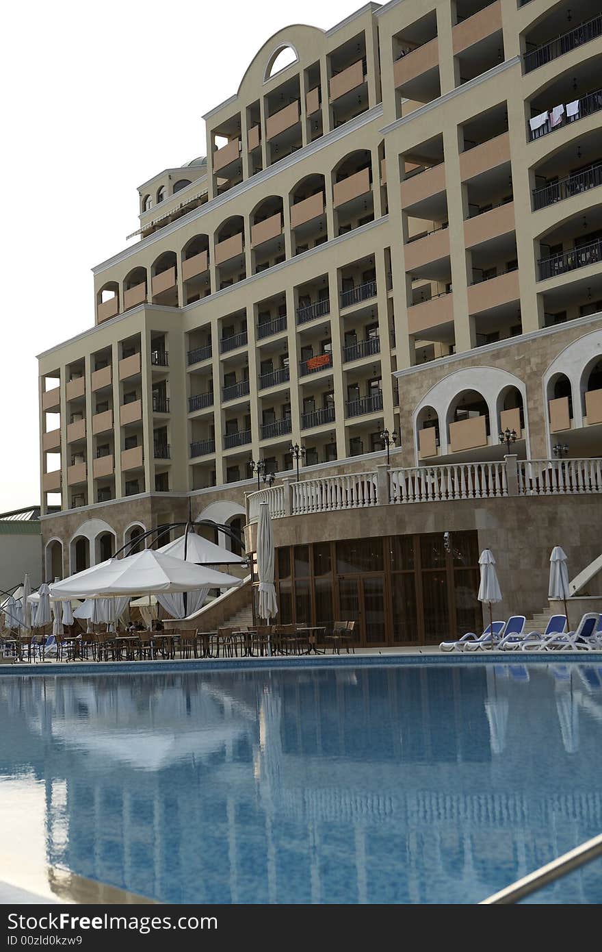 Swimming pool side with chairs