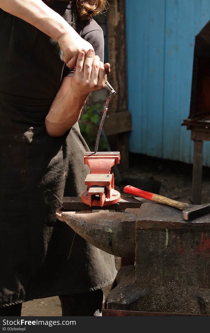 The blacksmith at works in summer, outdoor