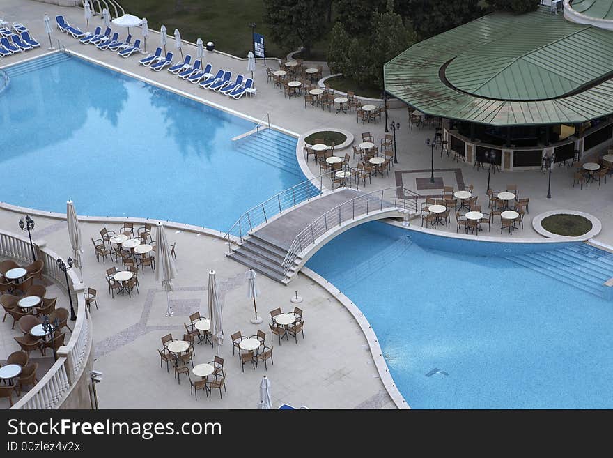 Swimming pool side with chairs