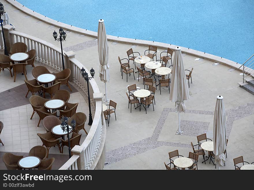 Swimming pool side with chairs