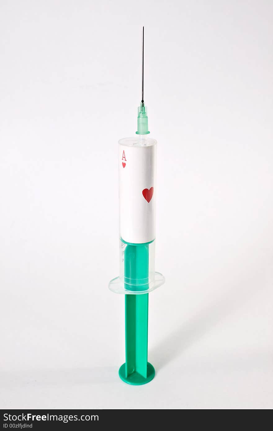 Syringe with ace of hearts