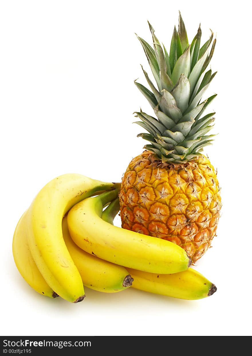 Pineapple and bananas isolated on the white background. Pineapple and bananas isolated on the white background