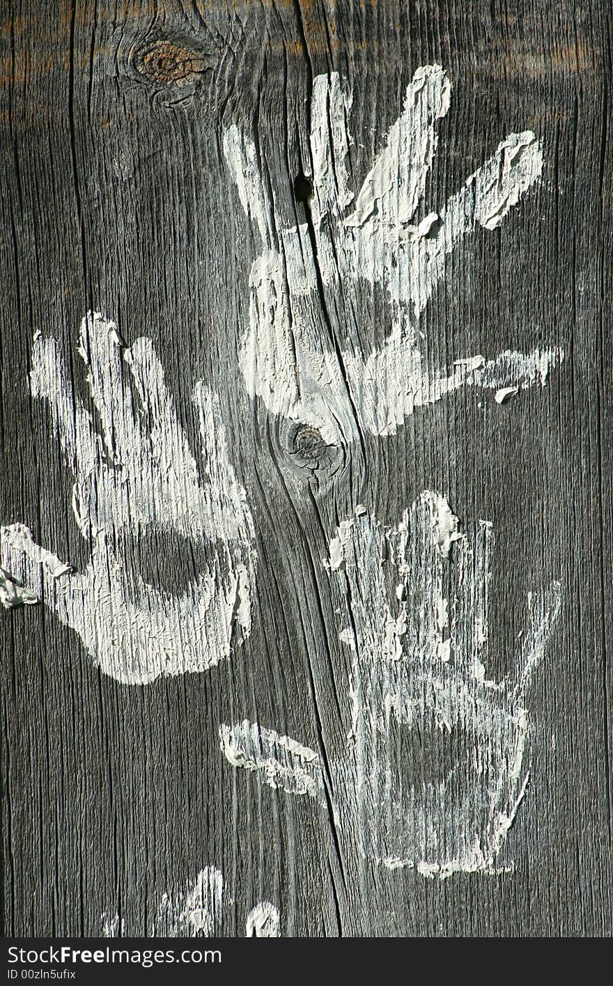 Handprints in Paint on Weathered Wood. Handprints in Paint on Weathered Wood