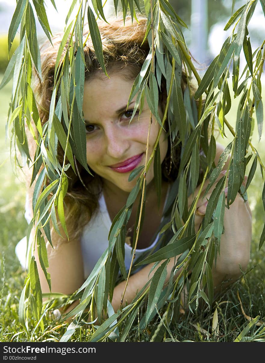 Smiling young beautiful girl outdoor